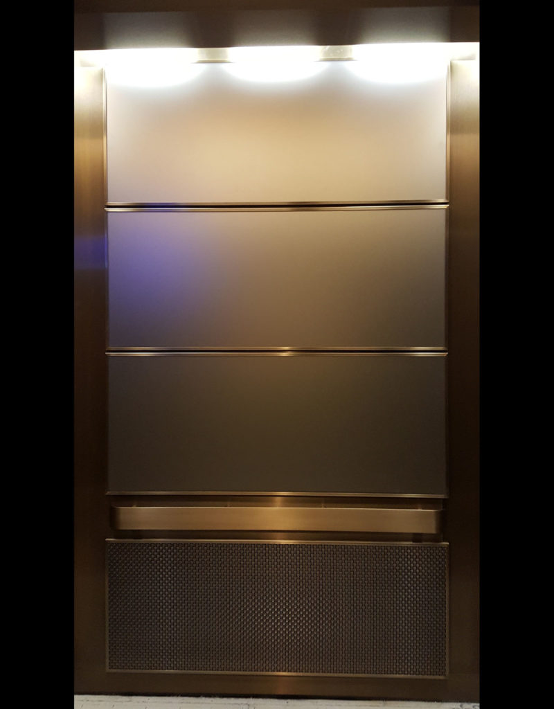 Glass and metal mesh back wall